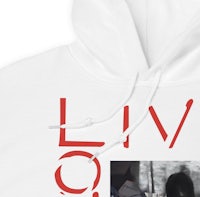 a white hoodie with a picture of a man and a woman